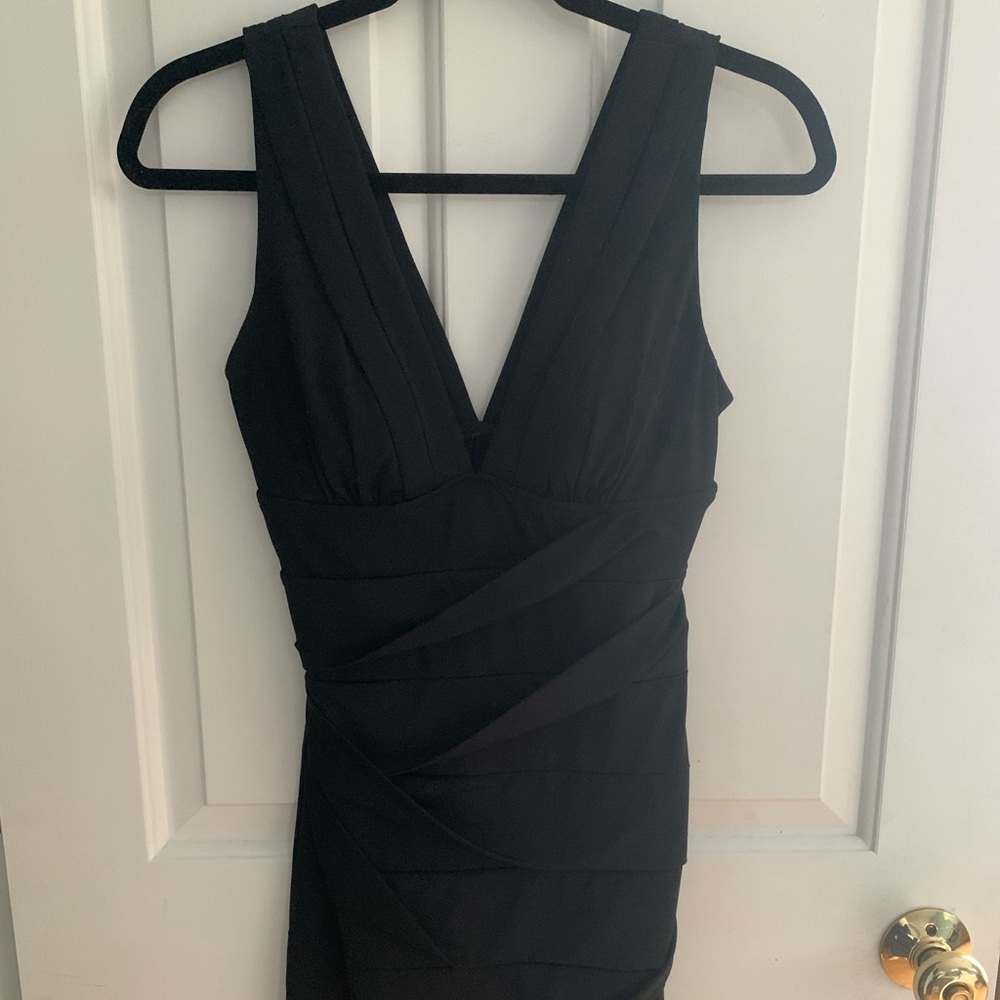 Tight black cocktail dress